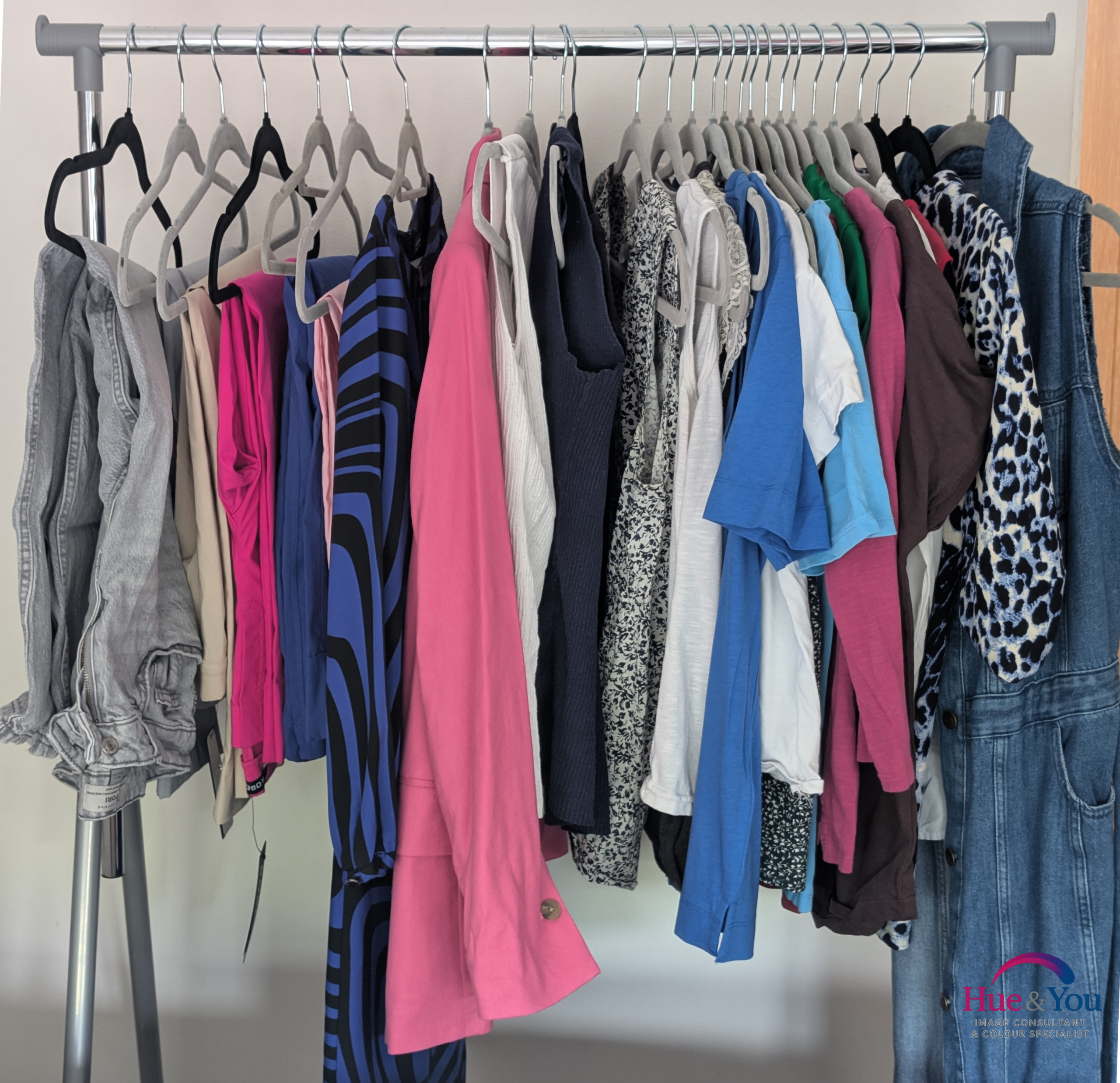 A styled clothes rail ready for a wardrobe application session